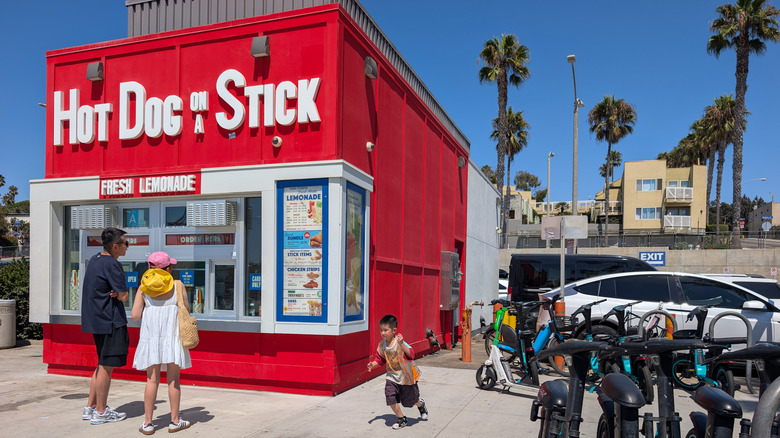Hot dog on a stick fast food chain in California with customers outside