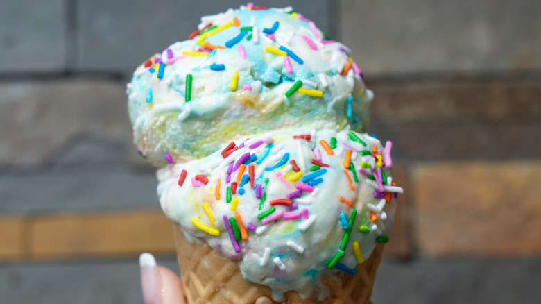 Birthday cake ice cream in a cone