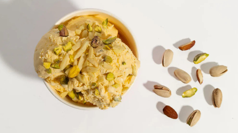 Cup of Kesar Pista ice cream from Mardi Gras ice cream.