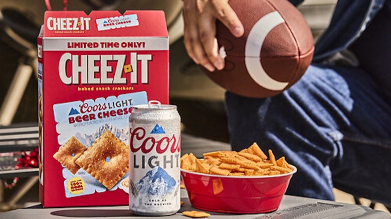 Cheez It x Coors Light Beer Cheese Crackers in a red bowl with beer can