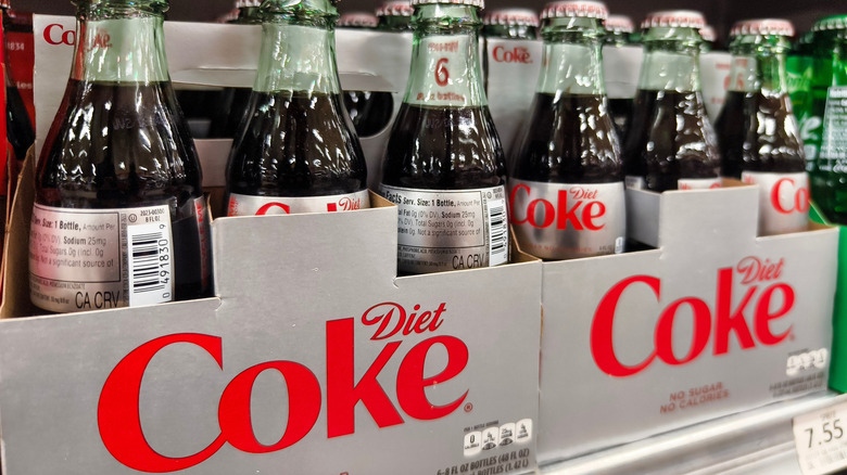 Six pack bottles of Diet Coke