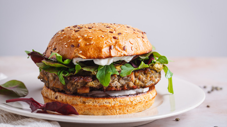 Veggie burger on a bun on a plate