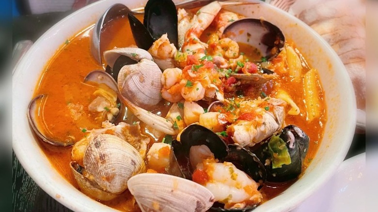 Ciopinno stew with mussels and shrimp in a white bowl from a Bay Area seafood restaurant