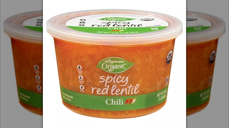 Spicy red lentil soup in a closed plastic container