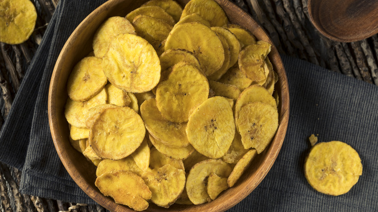 Plantain chips in wooden bowl