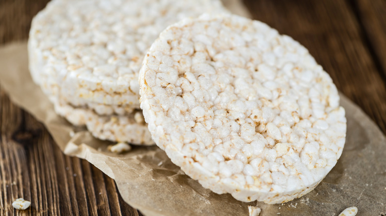 Stack of rice crackers on piece of parchment paper