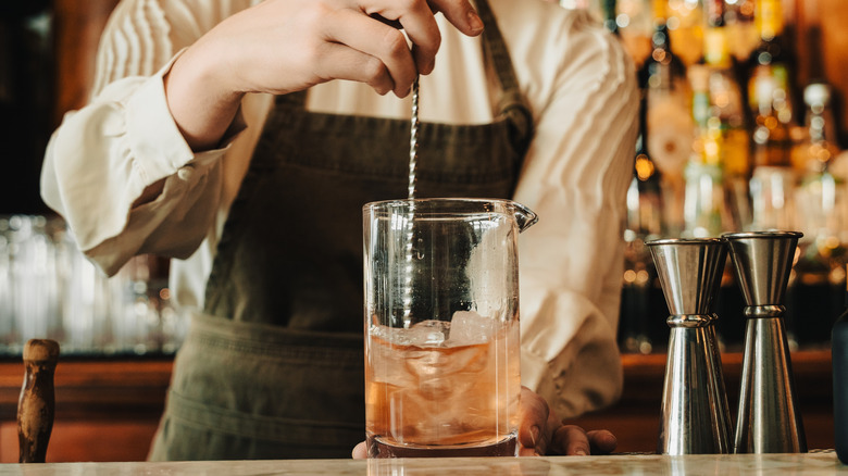 Bartender stirring a drink