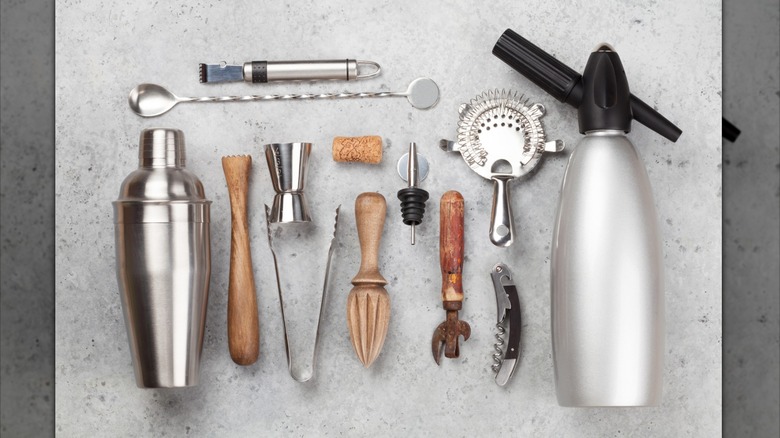 Several bartending tools on a countertop