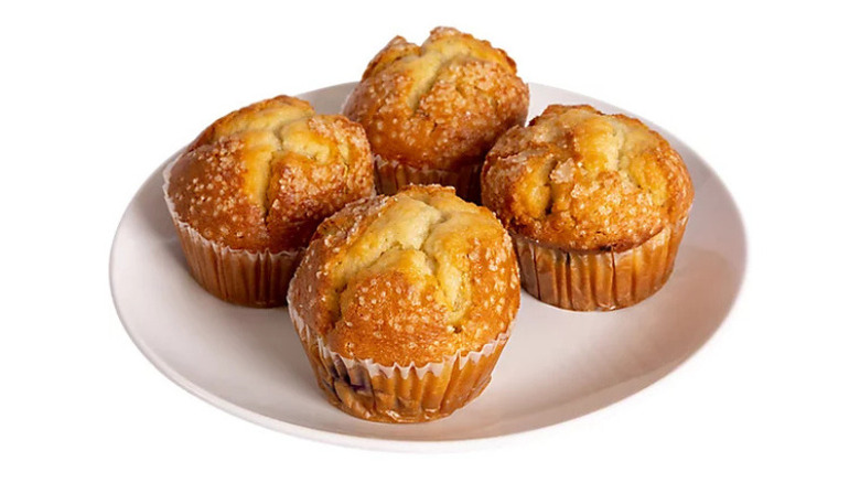 Plate with four sugar-topped muffins