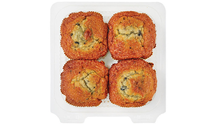 Overhead image of four pack of blueberry muffins