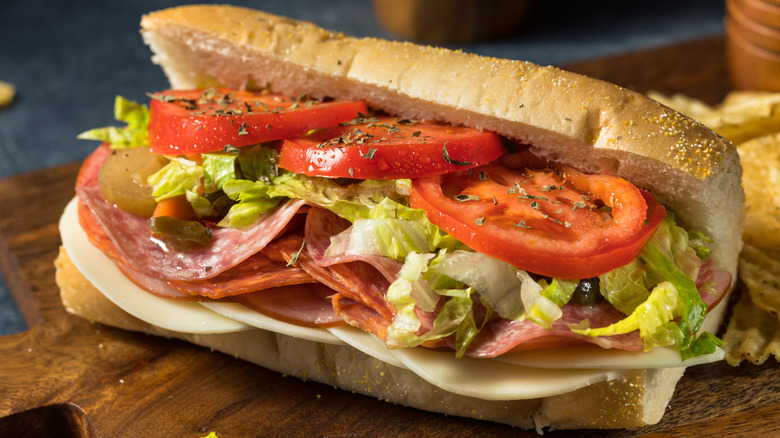 Sub sandwich with vegetables, cheese, and meat