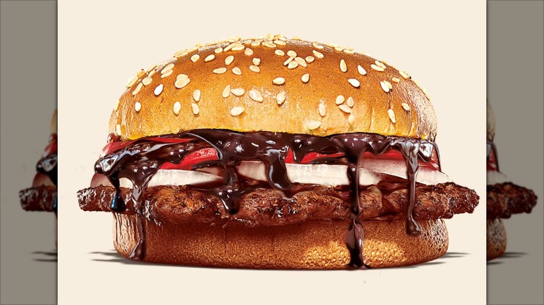 Chocolate Whopper from Burger King on beige background