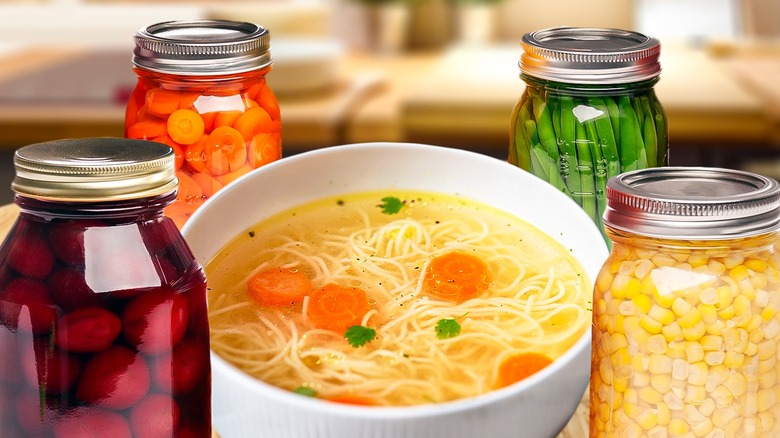 chicken noodle soup and jars of vegetables
