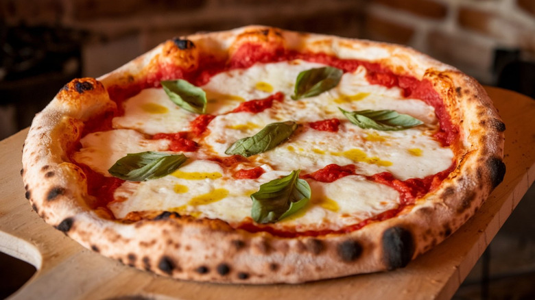pizza Margherita with melted mozzarella slices