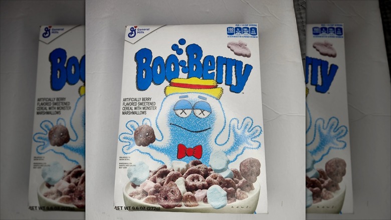 A KAWS Boo Berry box sits on a white table.