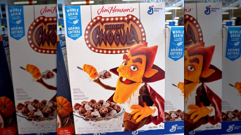 A box of Jim Henson's Count Chocula cereal sits on a grocery shelf.