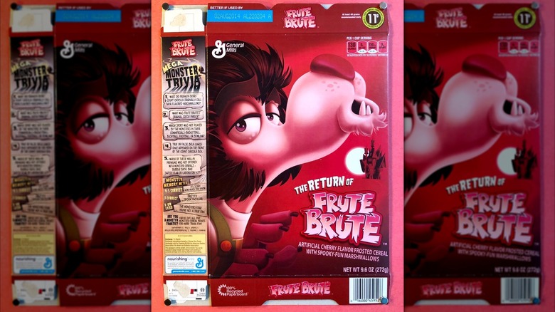 A flattened Return of Frute Brute cereal box sits against a pink background.