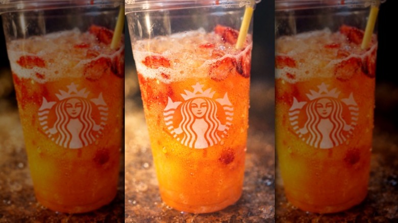 close up of a Starbucks Mango Strawberry Refresher