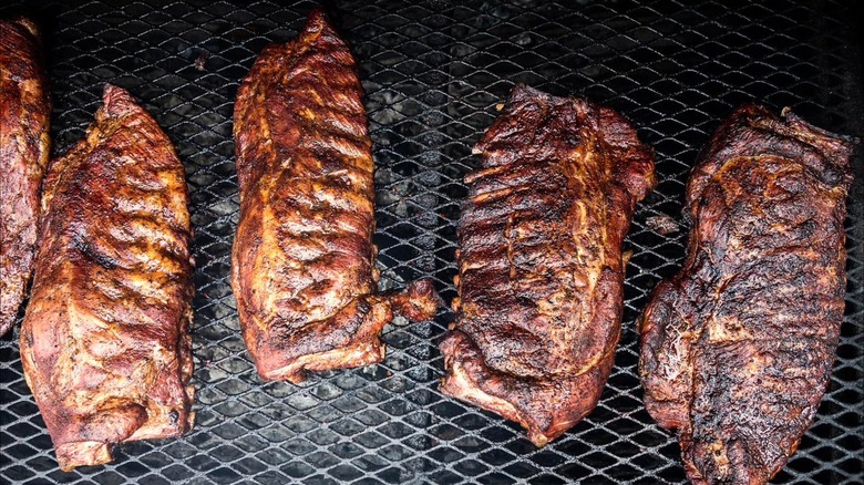 Racks of ribs in the smoker