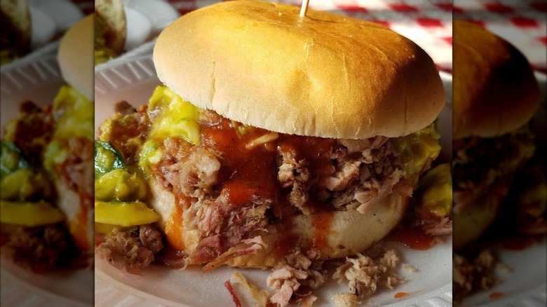 Pulled pork sandwich with bright mustard slaw