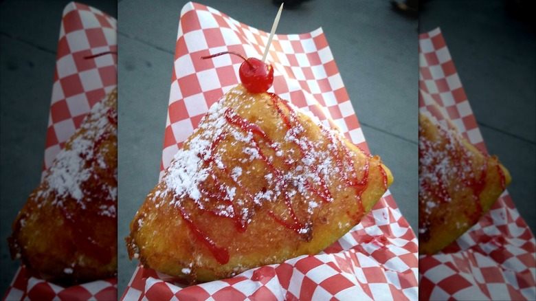 Slice of fried watermelon with maraschino cherry
