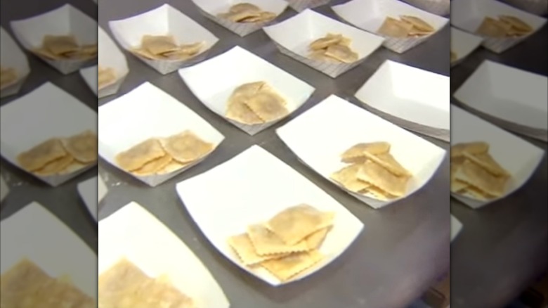 Paper trays full of fried beer parcels