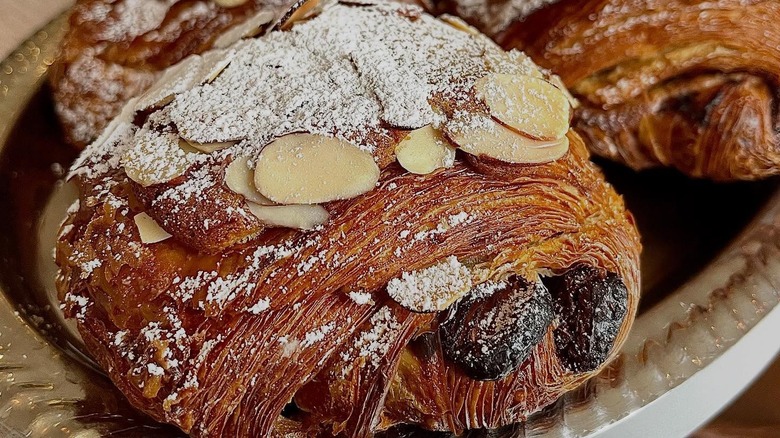 Chocolate almond croissant on display at OWL Bakery