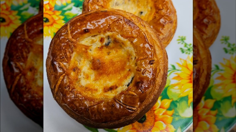 Ricotta pastry on sunflower-decorated plate at Up All Night Bakery