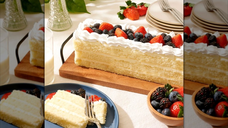 Chantilly cream bar cake with strawberries, blueberries, and blackberries on top