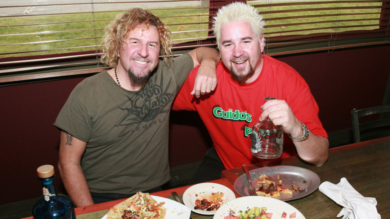 Sammy Hagar and Guy Fieri eating together