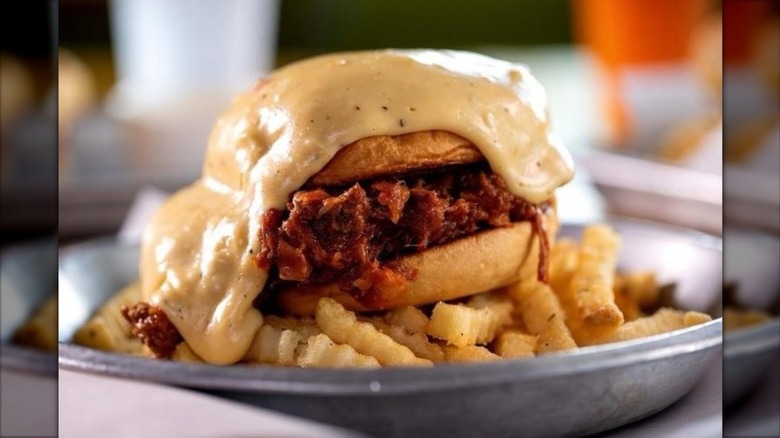 Sloppy Jo from Se7en Bites Bakeshop on plate of fries