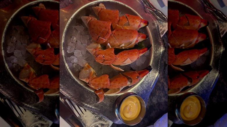 Lobster claws on ice in bucket