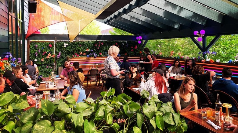 Guests dining on the outside patio at Dreamland Bar & Diner, Seattle