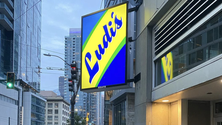 Ludi's blue and yellow sign in Seattle