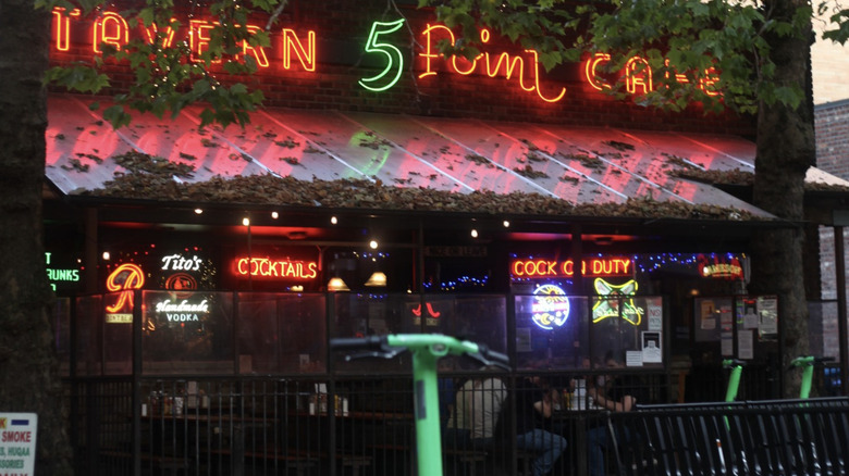 Exterior of 5 Point Cafe diner with a neon sign