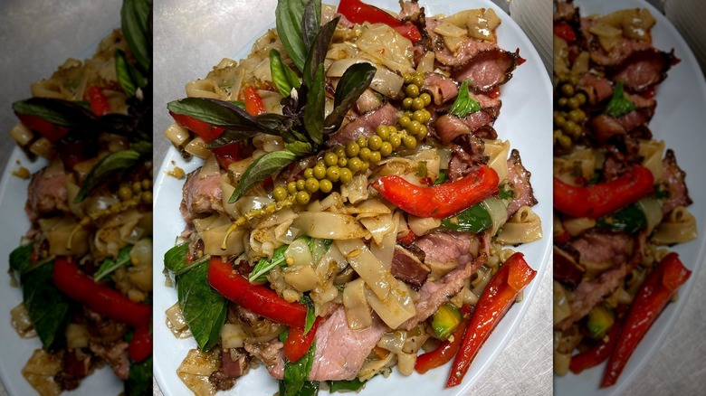 Pastrami Pad Kee Mao with noodles, Thai chili peppers, and pastrami