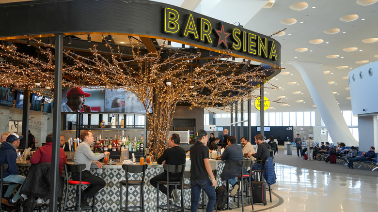 Bar lined with twinkling lights in the terminal at O'Hare International Airport