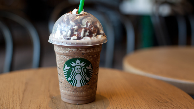 An iced mocha with whipped cream from Starbucks