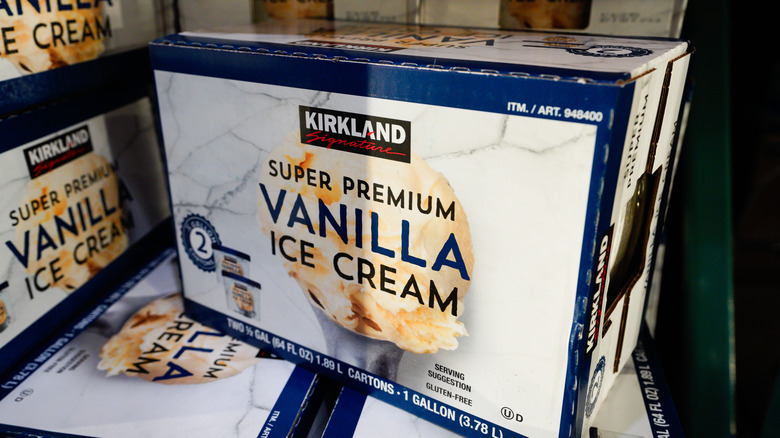Boxes of super premium Kirkland Signature vanilla ice cream at Costco, each containing two cartons