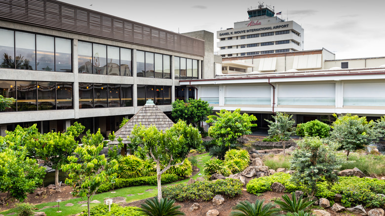 Honolulu airport and gardens in front
