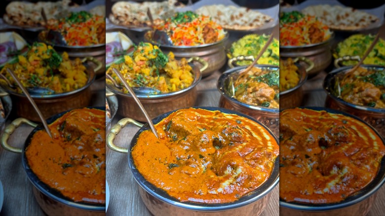Assortment of Indian dishes in silver bowls