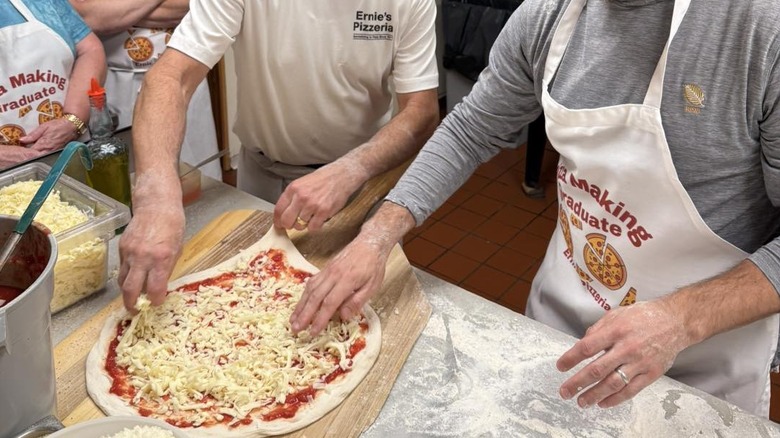 People making pizza at Ernie's Pizzeria
