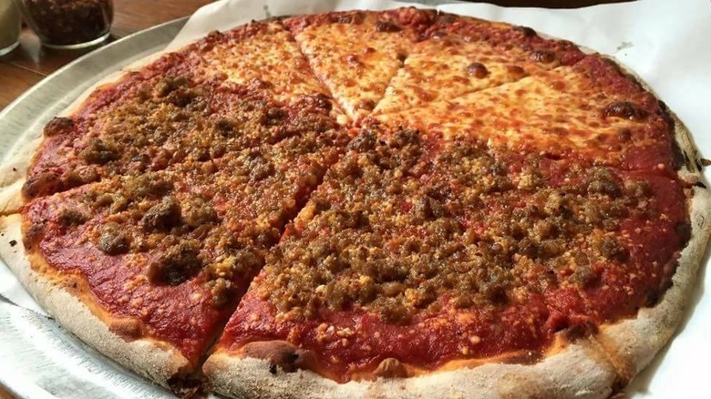 Pizza with two different toppings from The Little Rendezvous