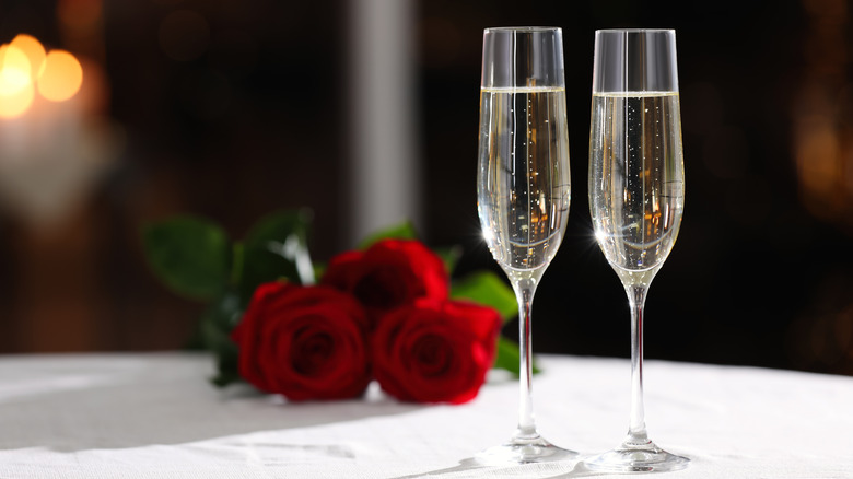 sparkling wine and roses