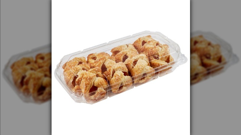 Costco Kirkland Signature caramel apple strudel bites in plastic bakery container.