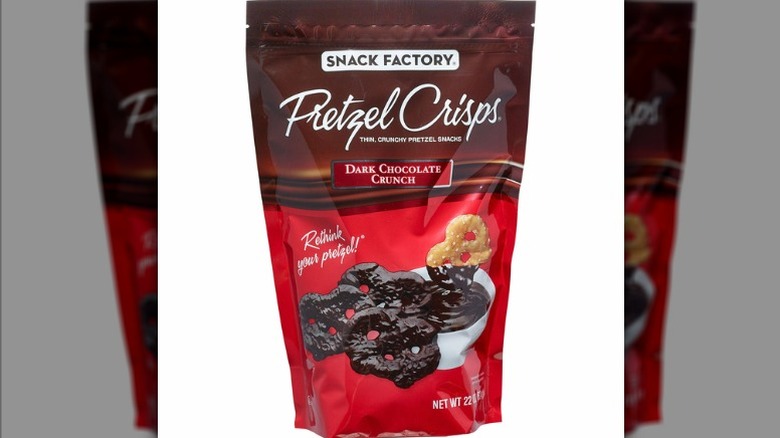 Snack Factory dark chocolate crunch pretzel crisps in branded bag packaging.