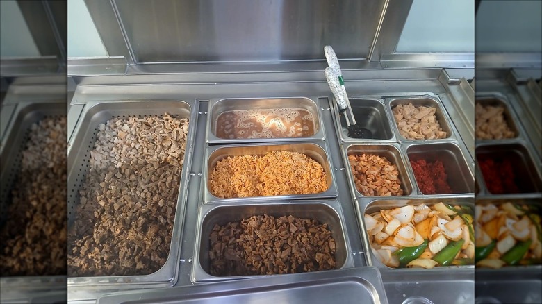 View of the toppings bar at Yetzi's Tacos