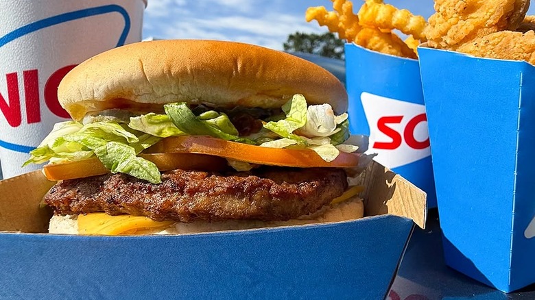 Sonic's $7 Big Deal Meal with cheeseburger, soda, tots, and chicken nuggets