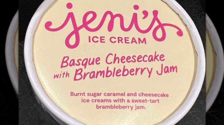 The lid of a pint of Jeni's Basque Cheesecake with Brambleberry Jam Ice Cream