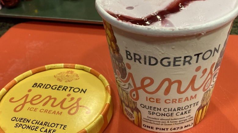 An open pint of Bridgeton-inspired Jeni's queen Charlotte Sponge Cake ice cream